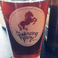 Laser engraved Prancing Pony logo on a beer glass